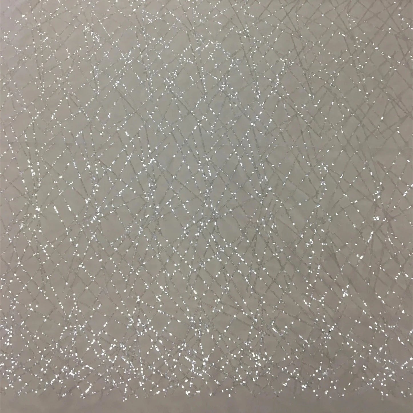 IVORY SEQUINNED TULLE