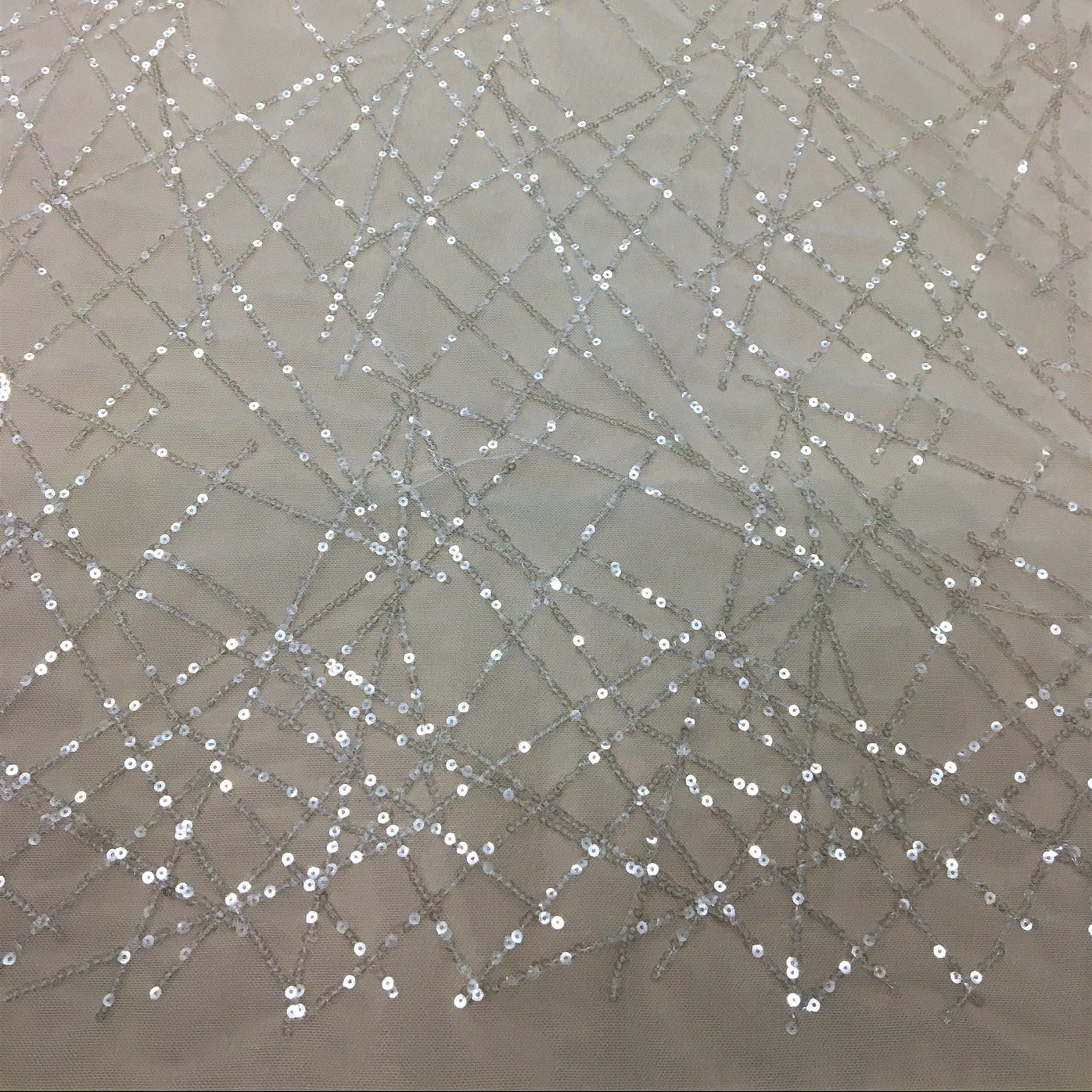 IVORY SEQUINNED TULLE