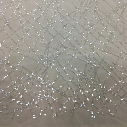 IVORY SEQUINNED TULLE